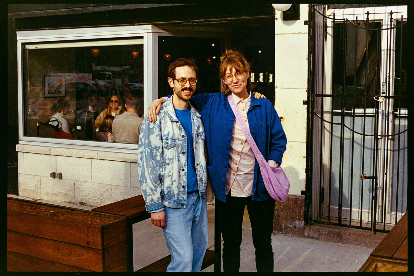 Lincoln and Kallie in front of a restaurant in Chicago