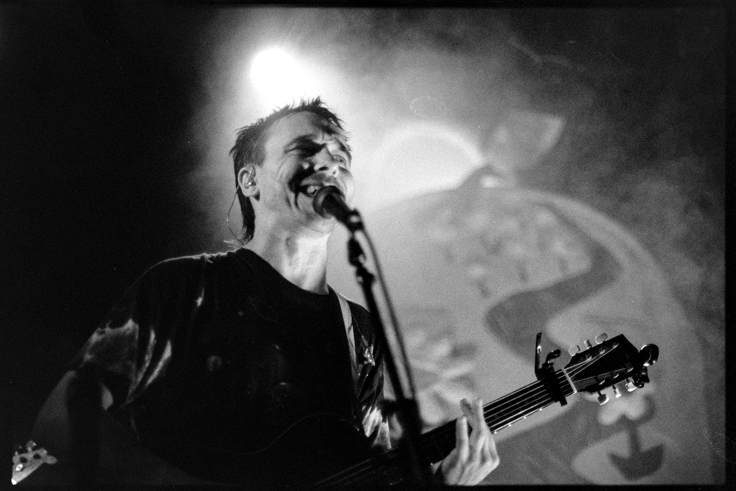 Alex playing guitar and singing in Rubblebucket concert in St. Paul
