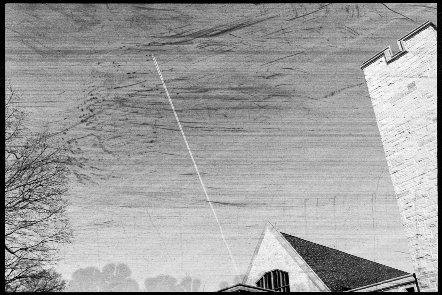 A long trail from an airplane in the sky