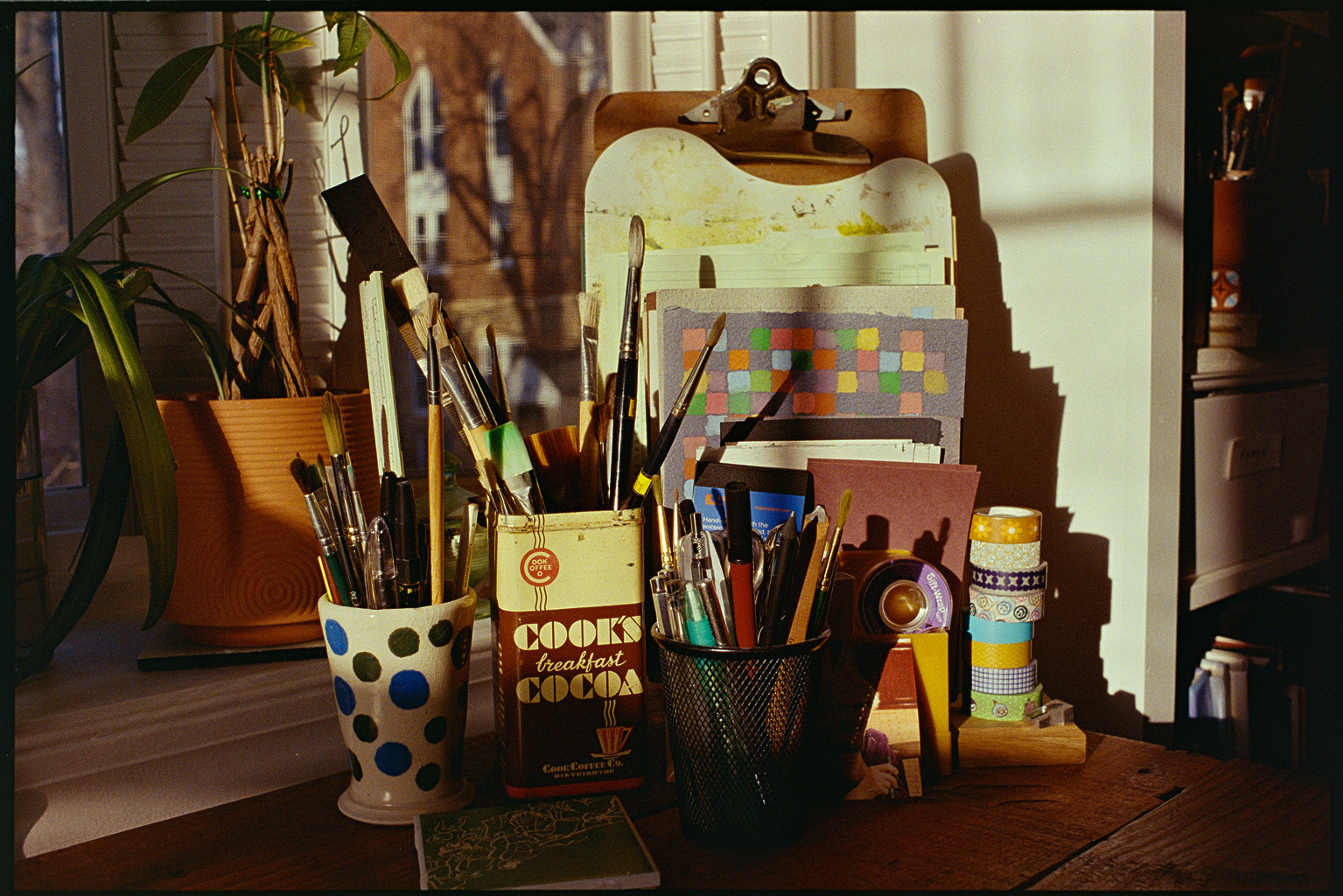 Art supplies in the evening sunshine in our downstairs office
