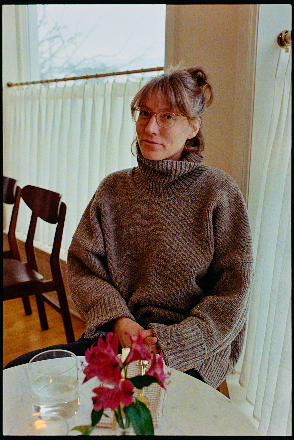 Kallie sitting at Daughers and Co for lunch in Door County, Wisconsin