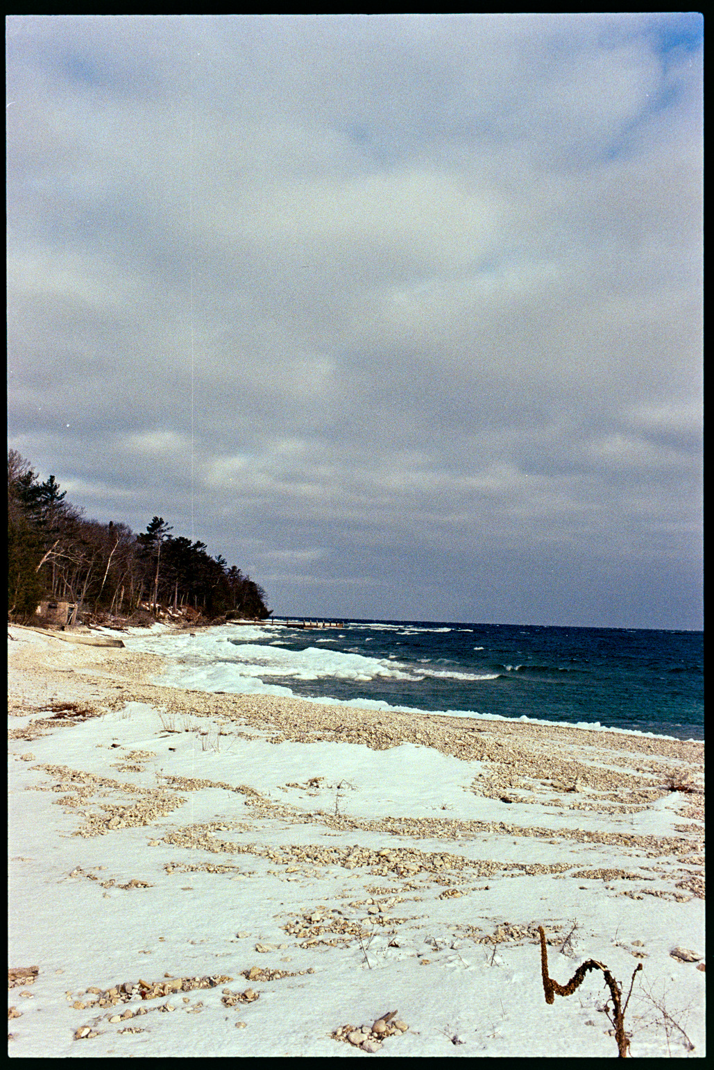 Snowy beach on a bright day at Cana Island in Door County, Wisconsin