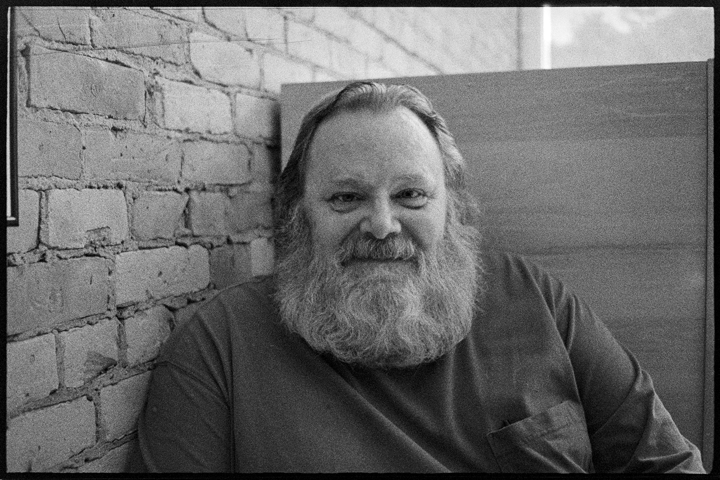 Ken, who looks like Karl Marx, sitting at Little Joy coffee shop