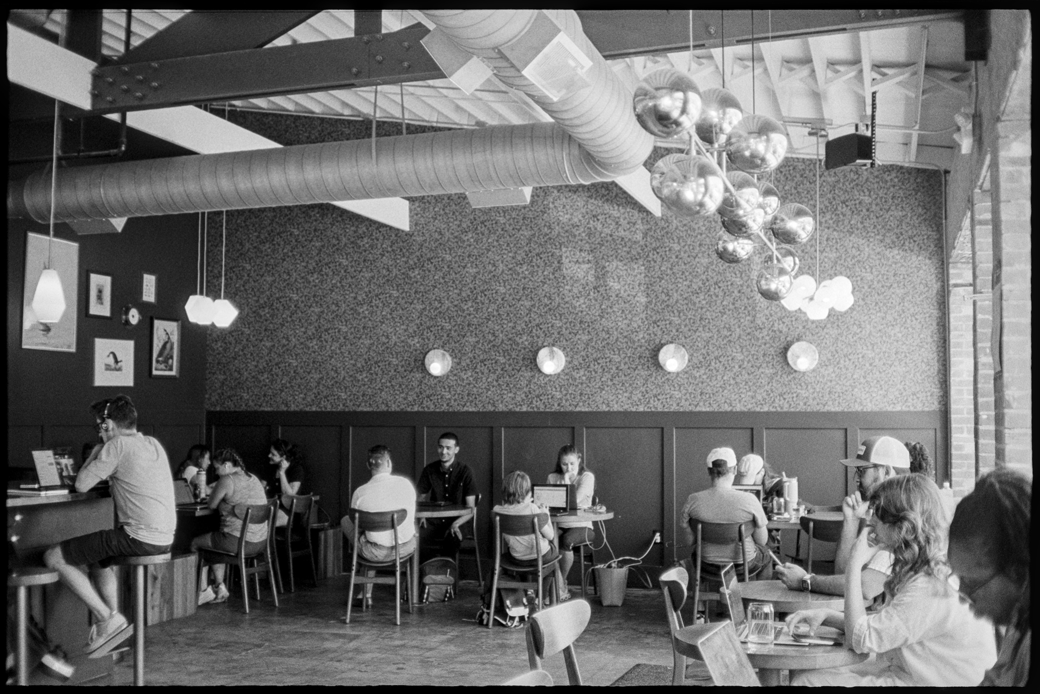 People seated inside East Pole Coffee in Atlanta