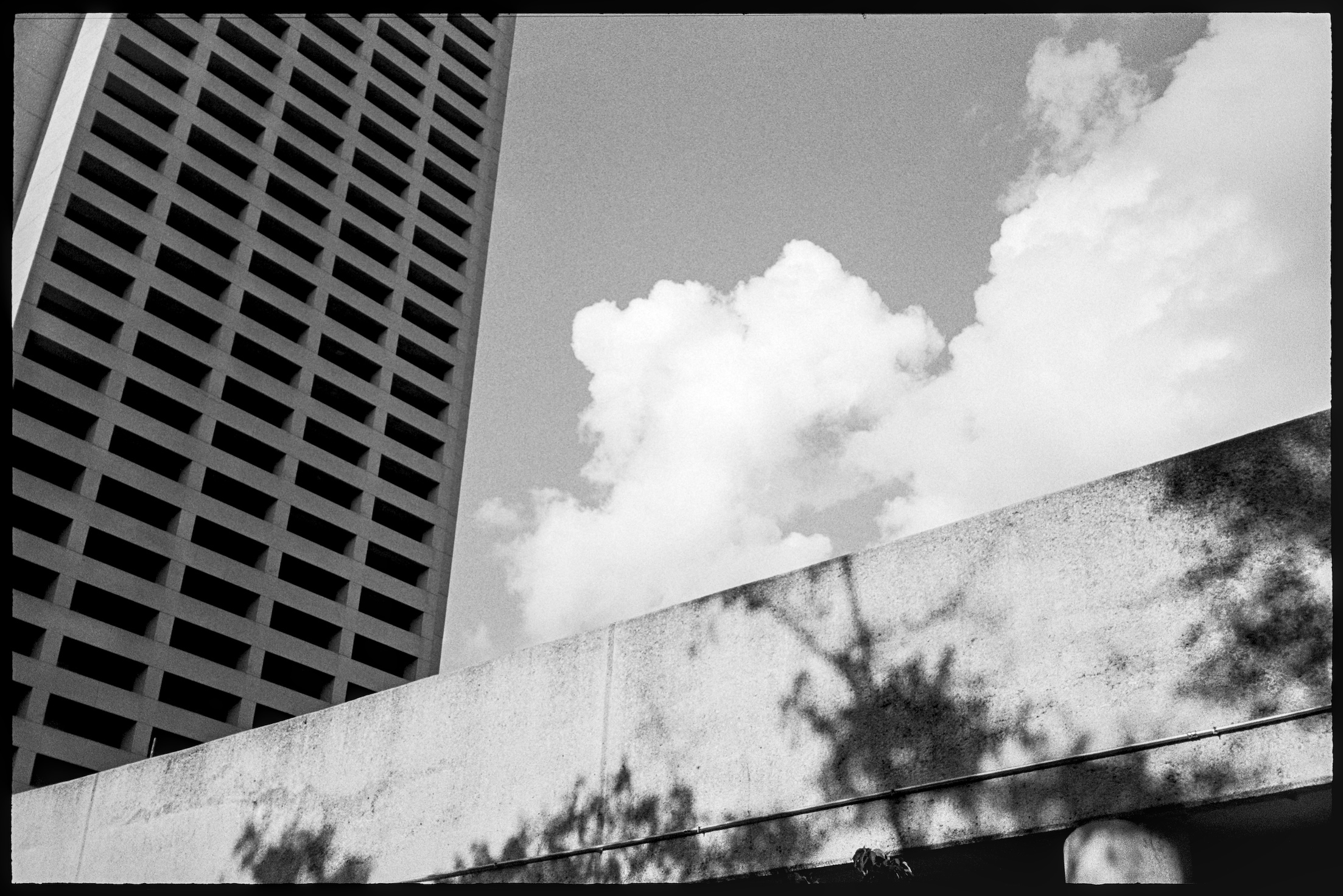 Building, parking garage, and big clouds in Midtown Atlanta