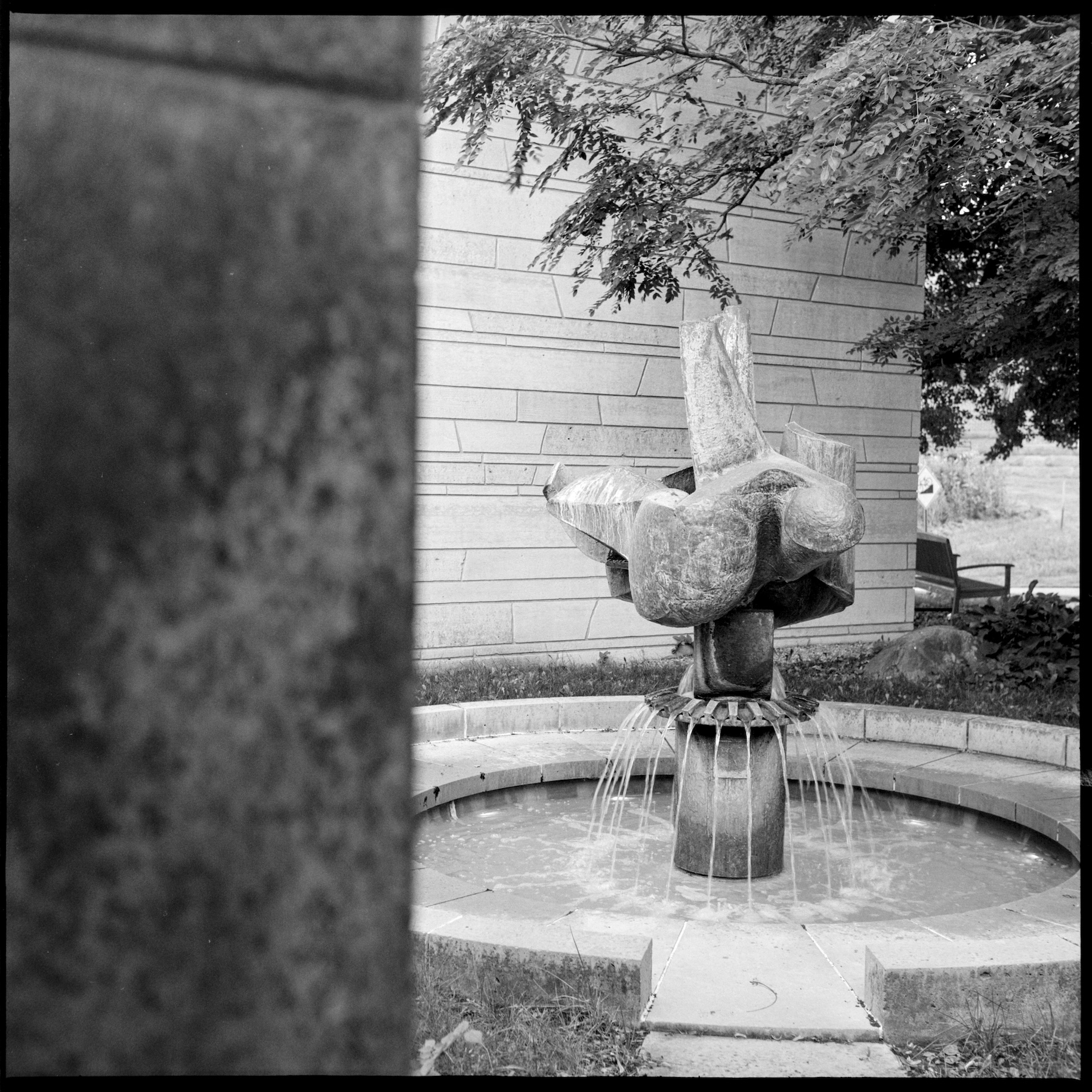 Fountain sculpture next to art building