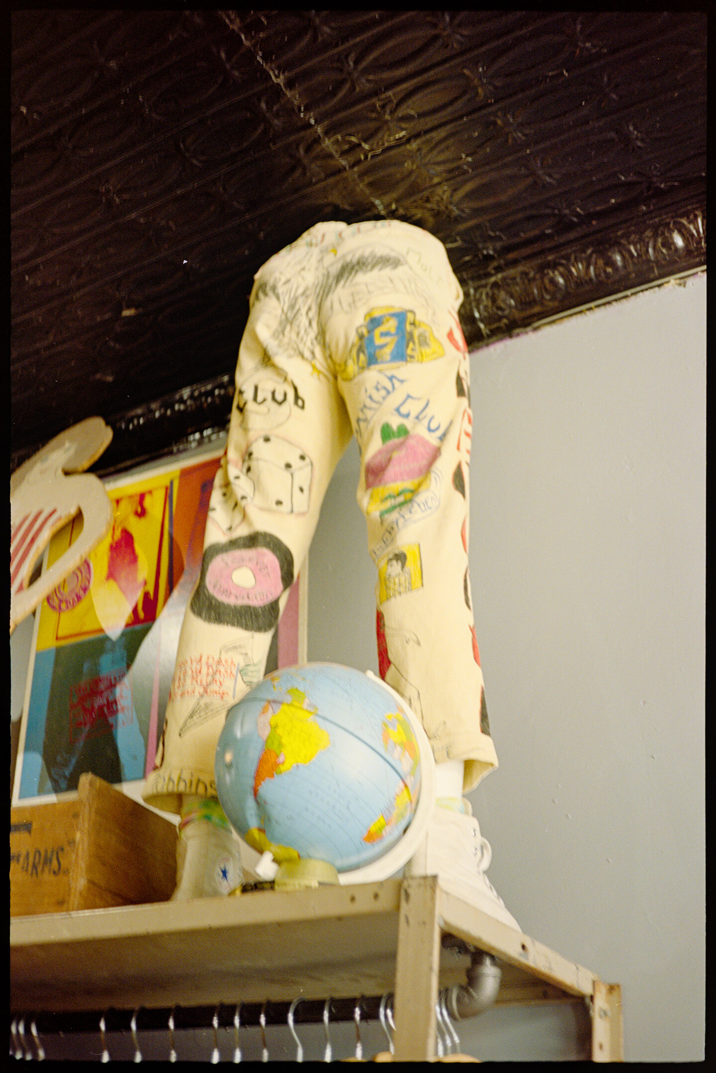 White jeans and a globe at Zodiac Vintage