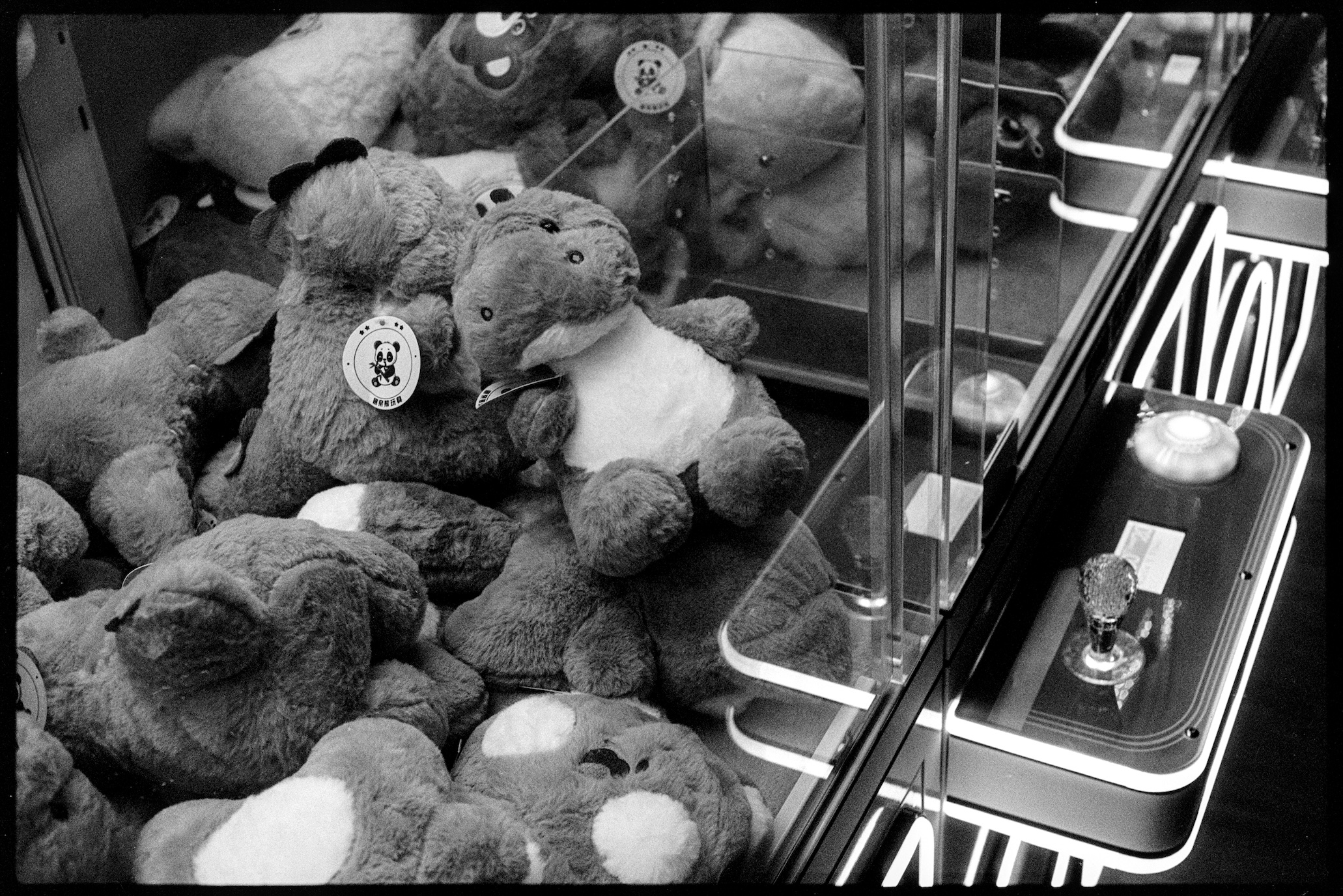 Claw machine with stuff animal