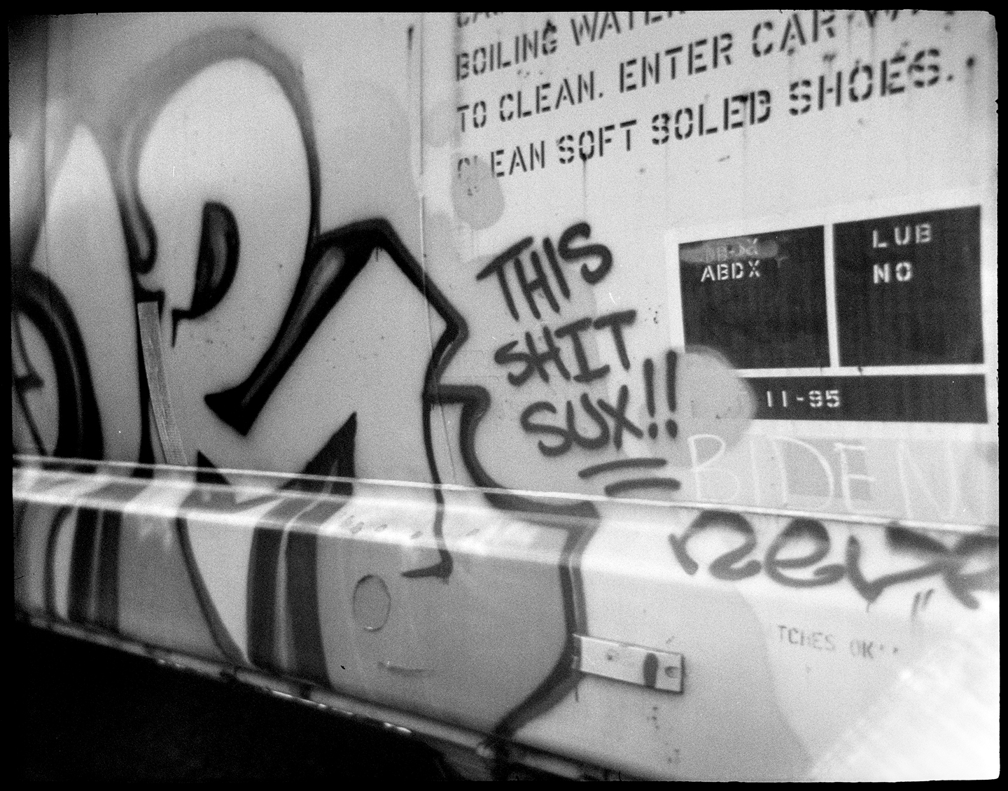 Freight train car with graffiti on it
