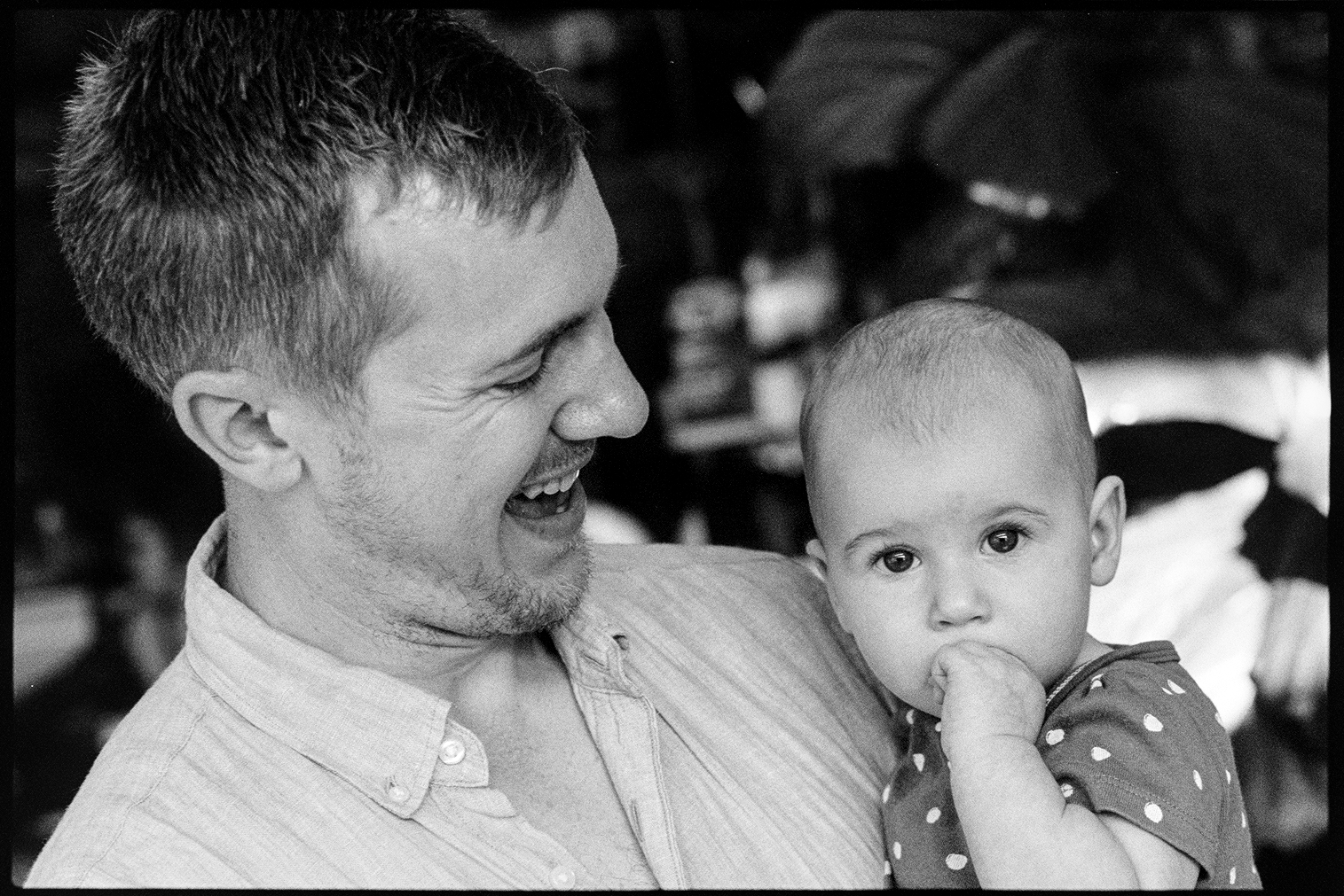 Rob holding his one year old daughter Sloane in his arms