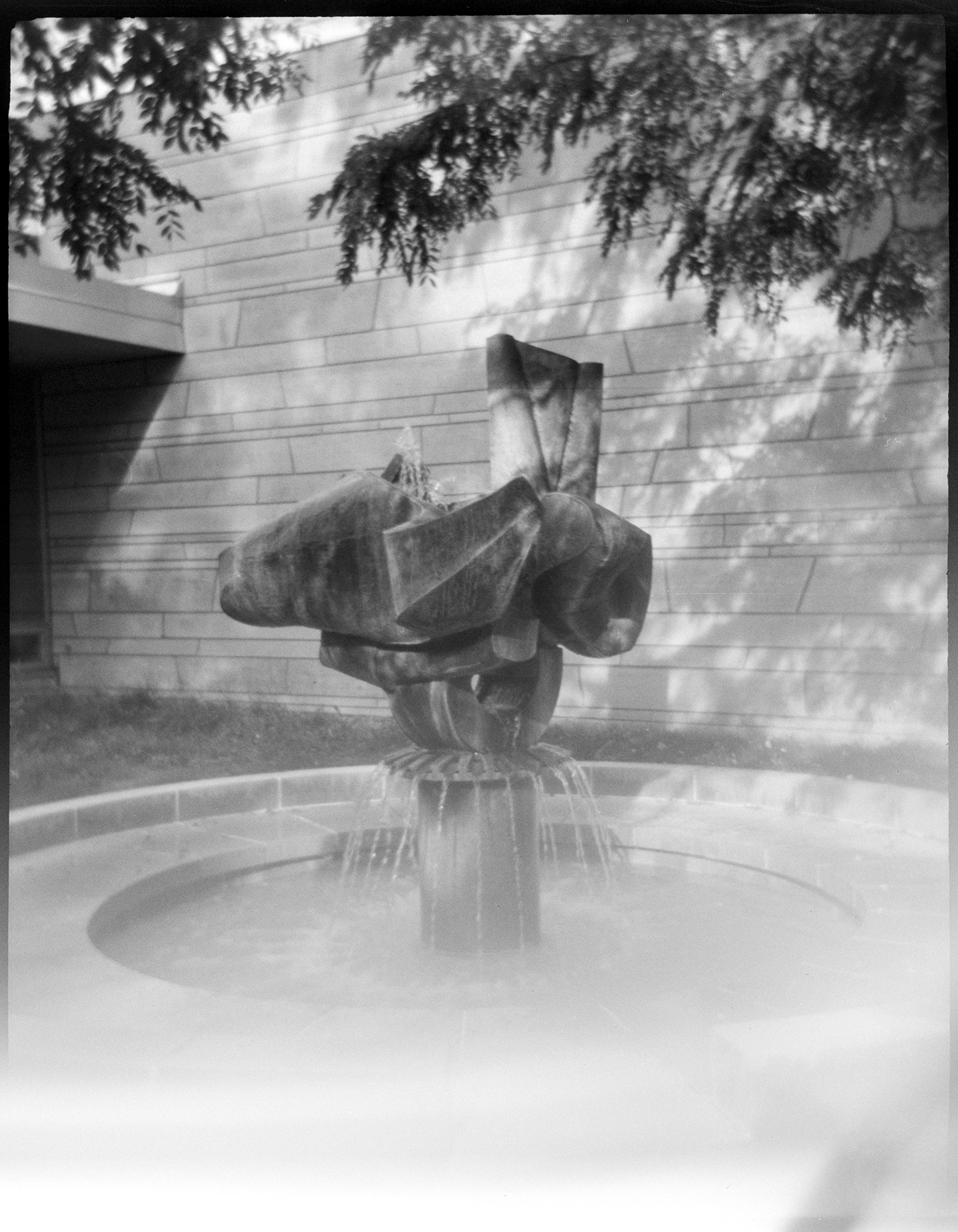 A sculptural fountain in front of the Bouliou art building at Carleton College