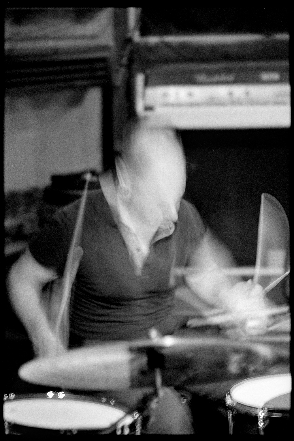 Andrea playing drums with motion blur