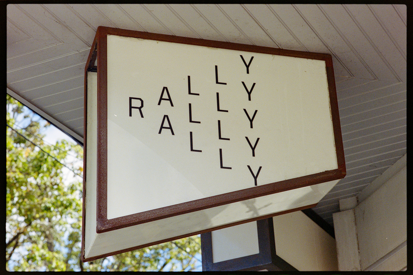 The sign out front for Rally Coffee