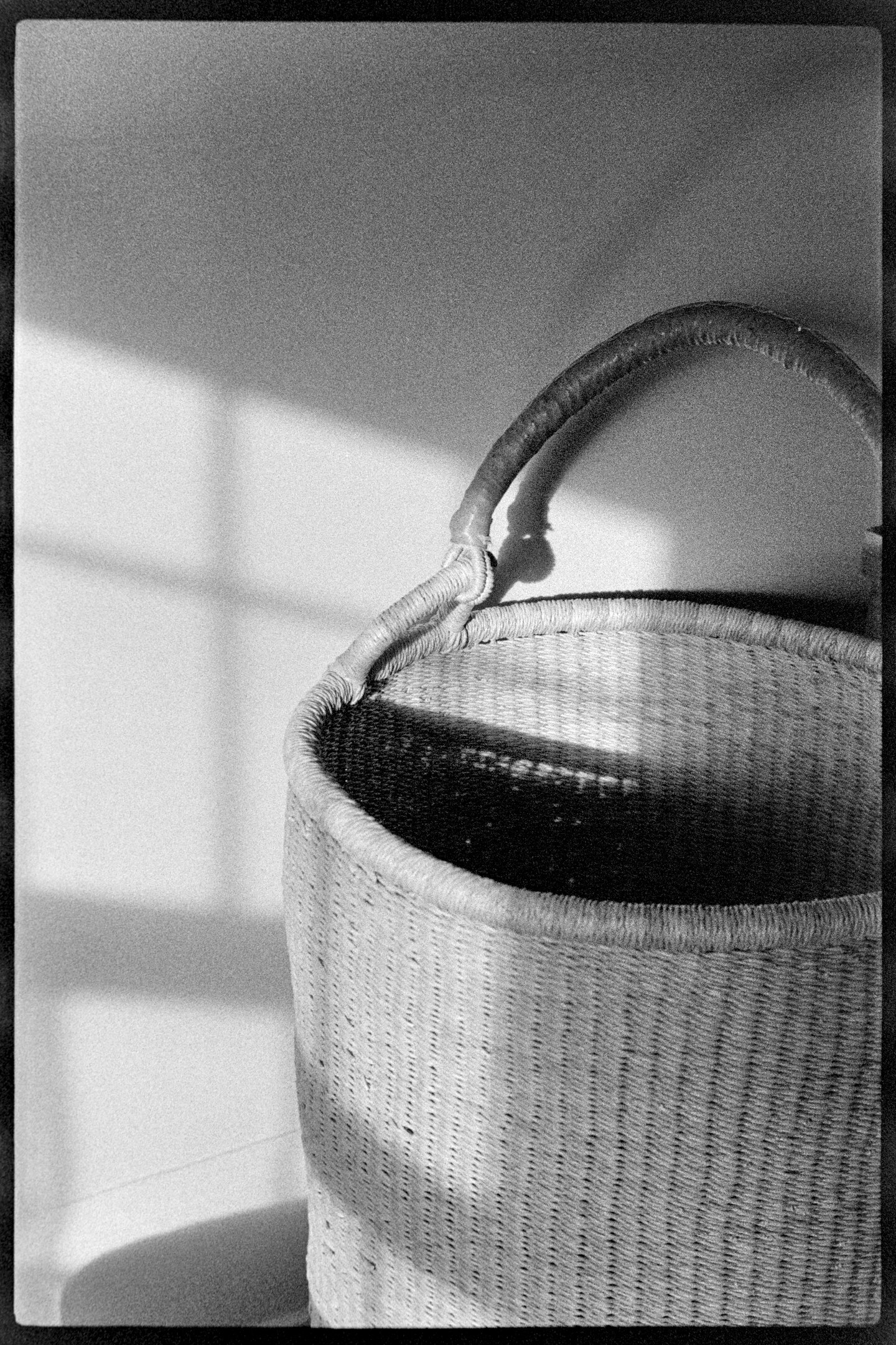 Wicker laundry basket in the afternoon sun