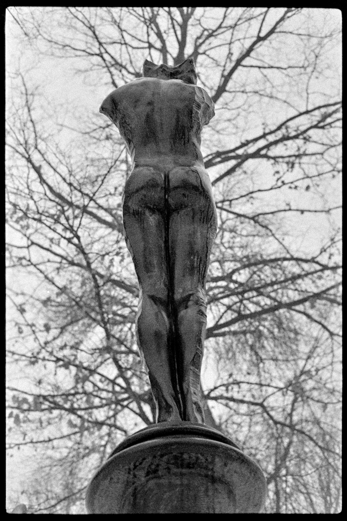 Statue of a nude without a head at St. Olaf College