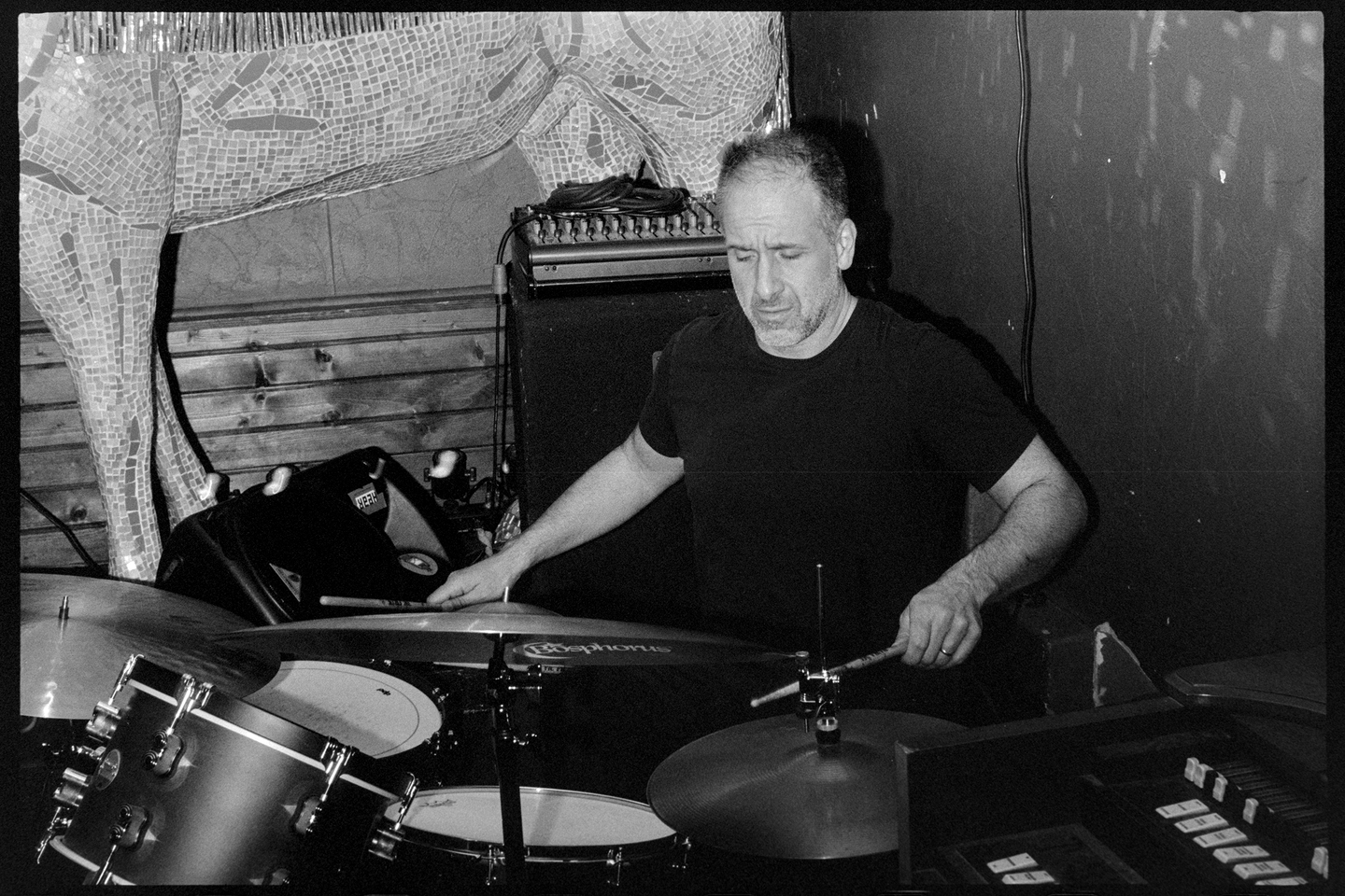 Andrea playing drums at the Contented Cow pub