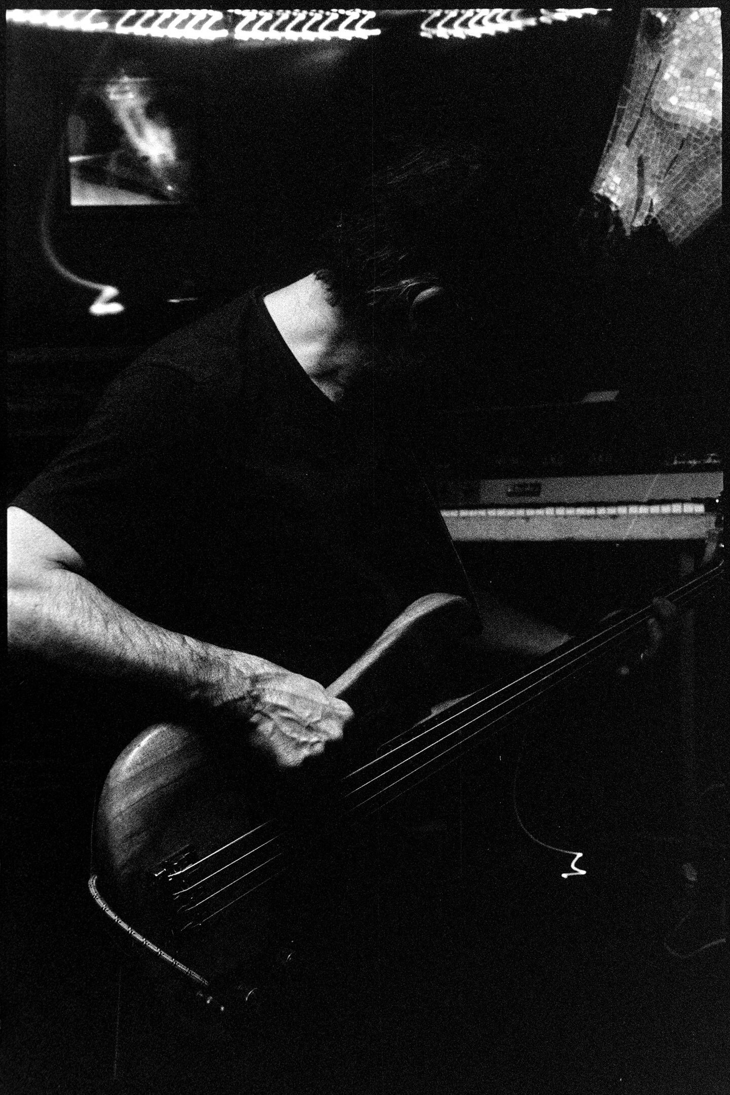 Brady playing bass at the Contented Cow pub