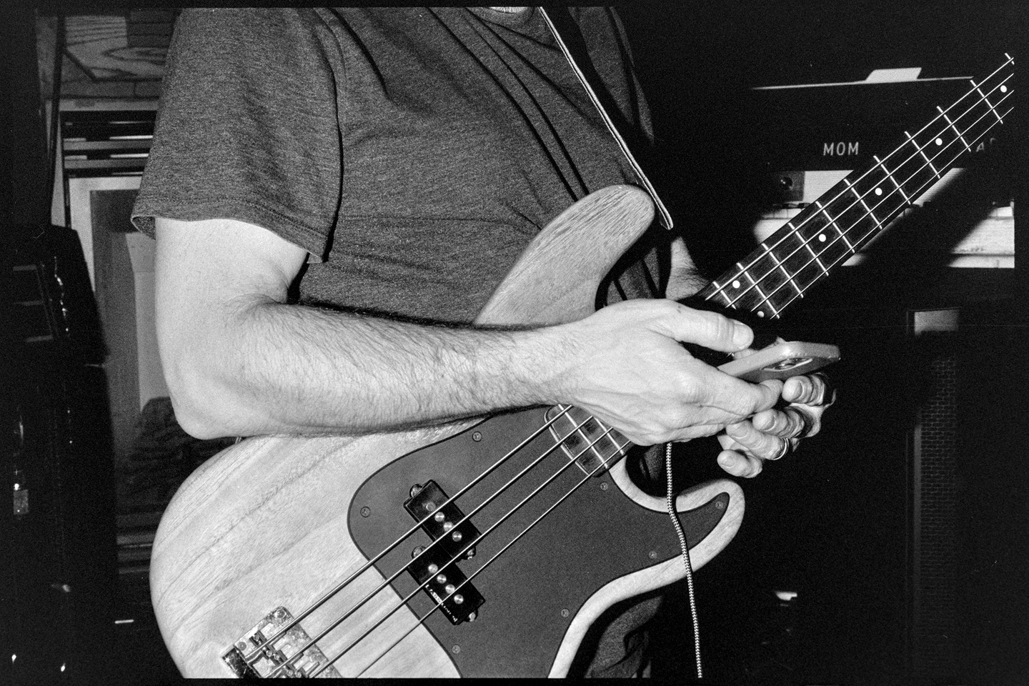 Brady changing the backing track on a smart phone for his set at the Contented Cow pub