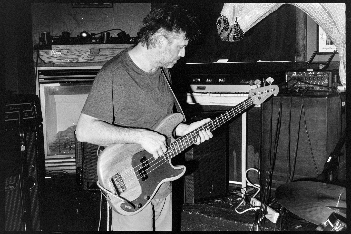 Brady playing bass at the Contented Cow pub