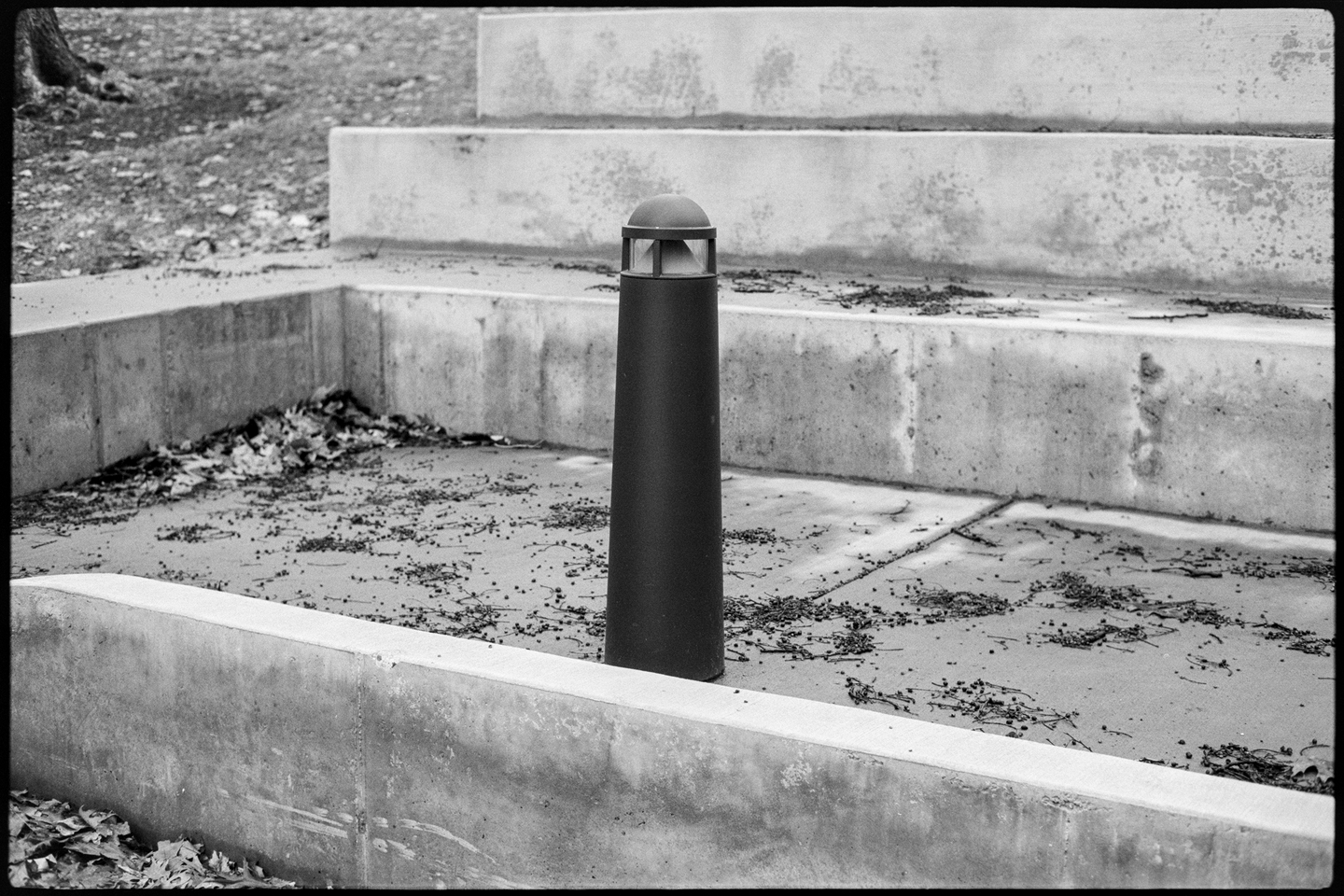 Concrete stairs and outdoor light fixture