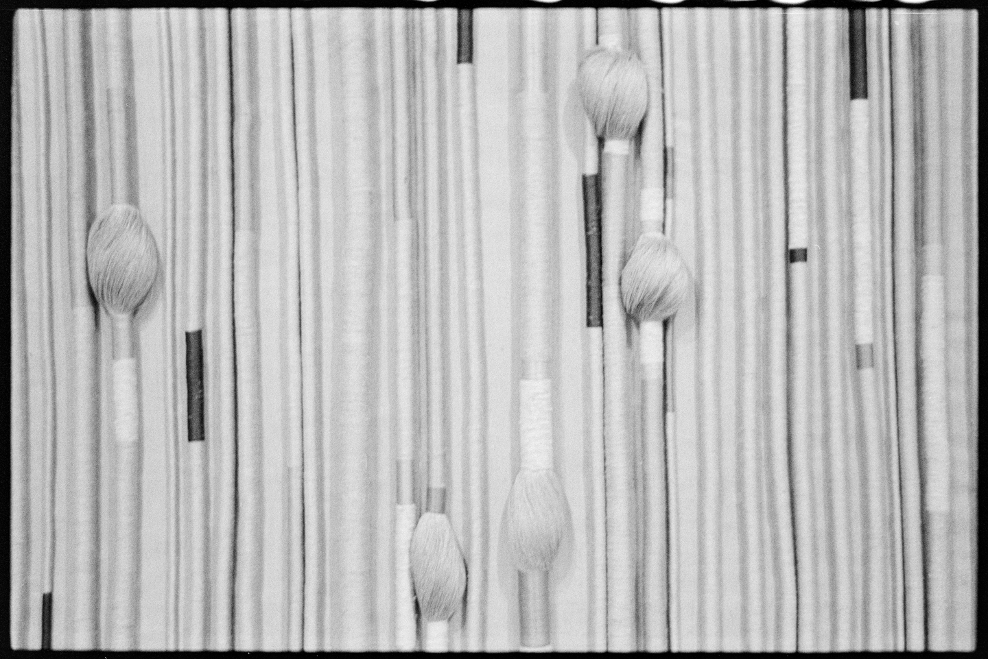 Fiber ropes hanging to form a tapestry by Sheila Hicks at the San Francisco Museum of Modern Art