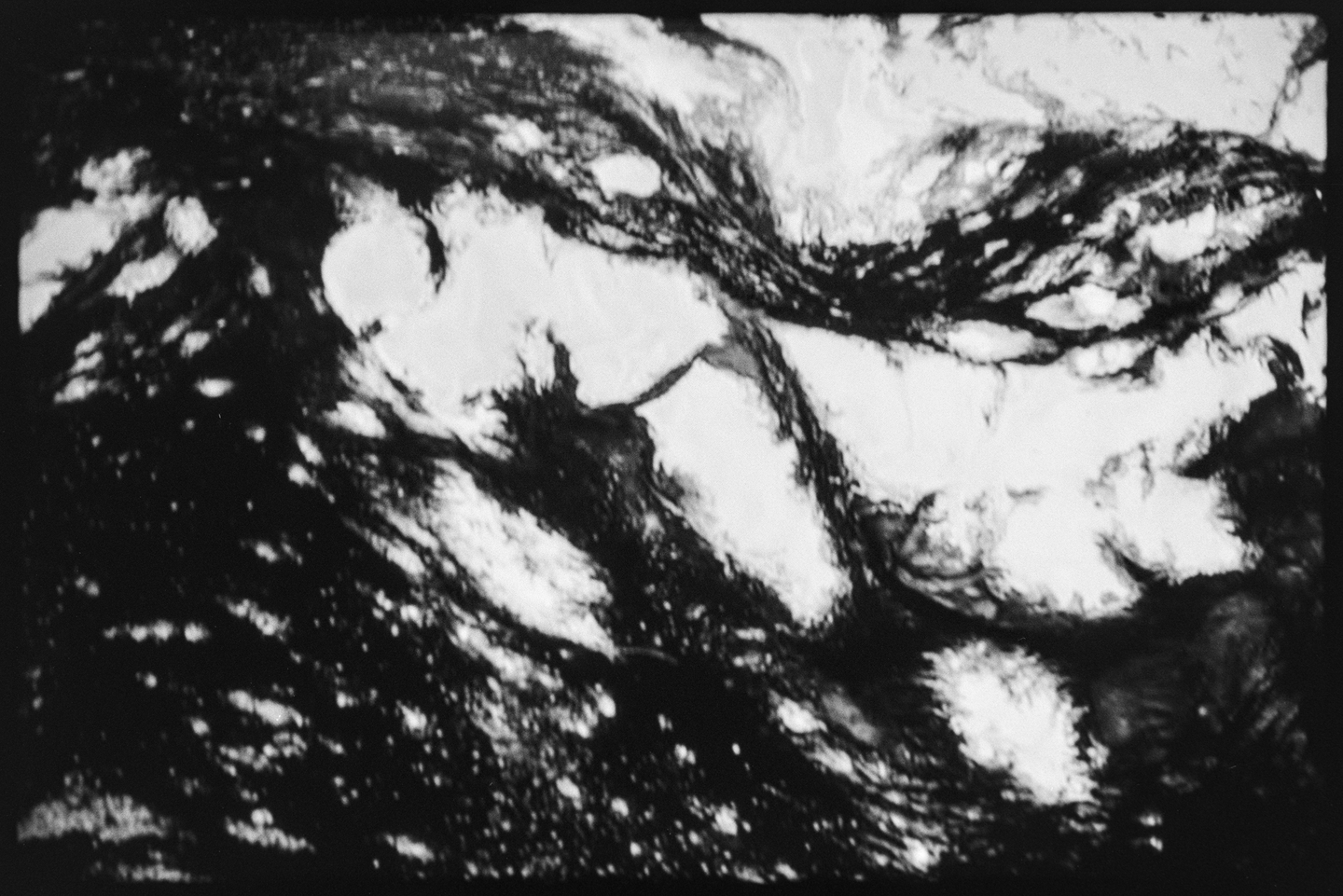 A still from an abstract visual art film by Michael Cina