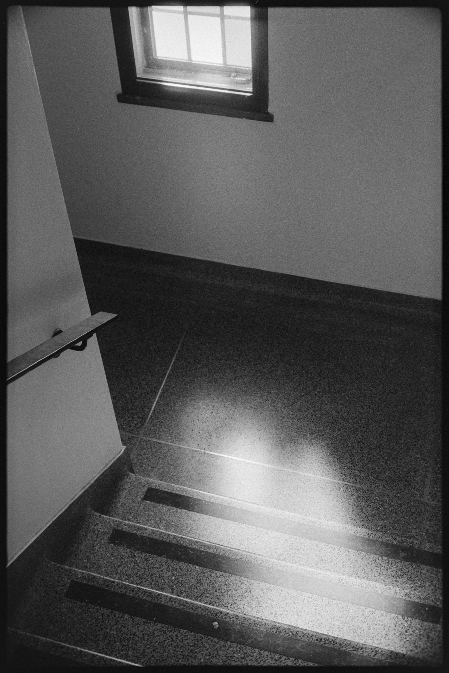 Light coming in from a window in a stairwell in Boe Chapel