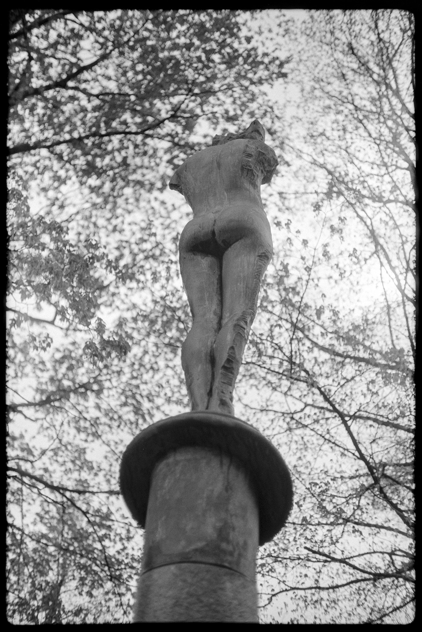 A statue of a nude person on the St. Olaf College campus