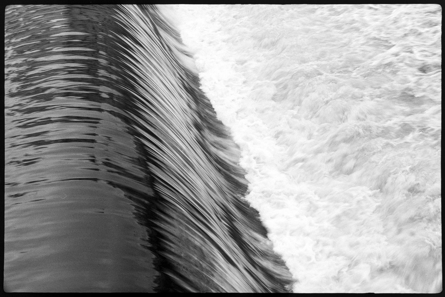 The Cannon River flowing down the damn in Northfield